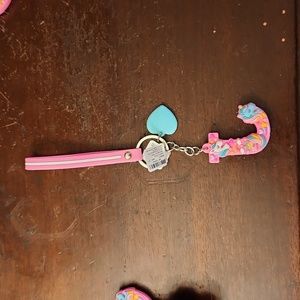 CLAIRS HOT PINK UNICORN LETTER KEY CHAINS